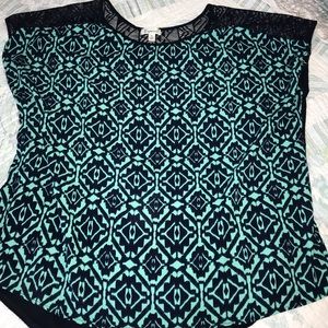 Cute light weight top. Back is solid dark blue